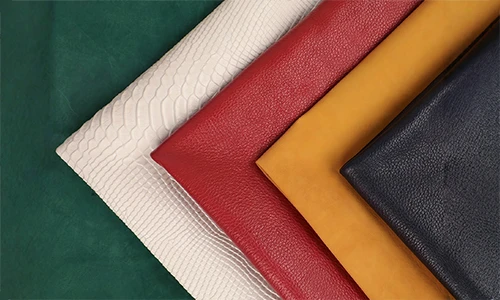 High-quality leather material swatches showing various textures like lychee grain and patterns, used for manufacturing premium genuine and vegan leather phone cases.