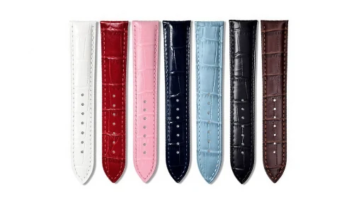 Collection of embossed leather straps in multiple vibrant hues, showcasing bespoke finishing options for custom accessory product lines.