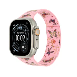 Floral Apple Watch strap with pink butterfly print and magnetic wrap design